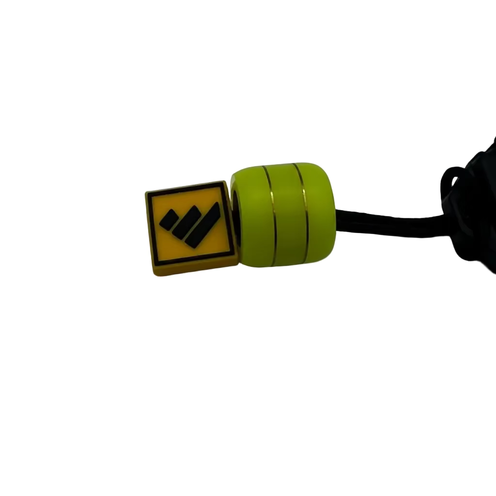 A yellow and black square-shaped magnetic lock with a bright lime green cylindrical component and a black cable, shown on a plain light gray background.